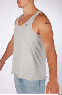 Darren casual dressed grey tank top upper body 0002.jpg